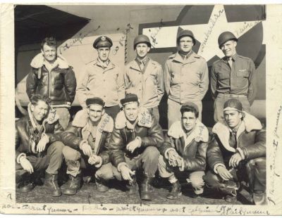 1943 - US Air Corps flying crew - John D Speakman front second from right
John D Speakman, (known to his family as Jack) was the second child born to Mary and Walter Speakman in 1924. When he came of age, he enlisted in the U.S. Army Air Corps and was assigned to the 701st Bomb Squadron, 445th Bomb Group, 2nd Air Division and assigned the position of tail gunner as part of a B-24 bomber crew.
This photo, taken October 1943, shows Jack, front row, second from right - sourced from http://www.dj1953.com/1944/sidney's-story.htm.
Shot down on 24th February 1944, he was interned as a POW until the end of the war. In November 1946, he married Betty Lee Millman. Between 1947 and 1965, they had a family of 9 children, raising them all in the Catholic faith.
Jack had the pleasure to see all of his grandchildren born but he passed away on 29th September 1992, just short of seeing the first of his great grandchildren.
