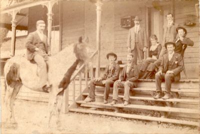 1900 approx Lower Plenty Hotel Ned Kent on horse, Susan Kent nee Carrucan probably sitting on steps
Susan Carrucan (1862 - 1943), the third eldest child of Patrick Carrucan and Mary O'Brien, married Edward Shae (Ned) Kent (1858 - 1907) in 1881. Ned Kent owned the Plenty Pub and pubs in Diamond Creek, Christmas Hills and Bulleen and an orchard in Eltham. He is shown seated on a horse outside the Plenty Pub at Lower Plenty while we think it is Susan seated on the steps with a group of others. As he died in 1907, aged 49, this photo must predate that date.
