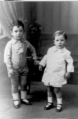 1917 - Ivan and Con Carrucan, children of John Francis and Margaret Carrucan
Taken in 1917, this photo shows Ivan Francis and Cornelius Patrick (Con) Carrucan, the eldest children of John Francis (Jack) and Margaret (Maggie) Carrucan of Cheswick. Ivan and Con were great grandsons of Patrick Carrucan who migrated from Co. Clare to Eltham in the 1850s. Ivan was born 30.11.1913, married Ellen Kiniry in 1969 in Melbourne and died on 15.5.1994, aged 81 years. Con was born 14.3.1915, married Clare McArdle in 1945 and died in a drowning accident 1.3.1949.
