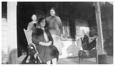 1926 - Carrucan photo at Dalton St - Nana (Hooley), Betty and Mary Carrucan
On the front porch at the Dalton St Eltham farmhouse circa 1926. Mary Carrucan (nee Sweeney) is back right and her daughter Betty is back left. Mary's sister Ellen (Nana) Sweeney is seated.
