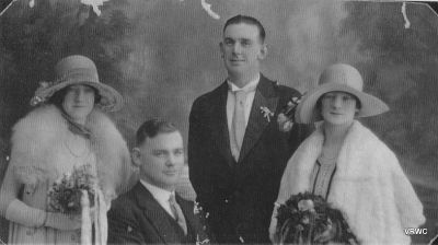 1926 - Sylvia Barry James Calnin Maurice Calnin Margarita Barry
Maurice Calnin (second from right) at the marriage of his younger brother James (seated) and Margarita Barry (on right) in 1926. Bridesmaid Sylvia Barry is on the left.
Maurice and James were 2 of the 10 children born to James Calnin and Annie (Babe) Carrucan and were grand children of Patrick Carrucan and Mary O'Brien.
