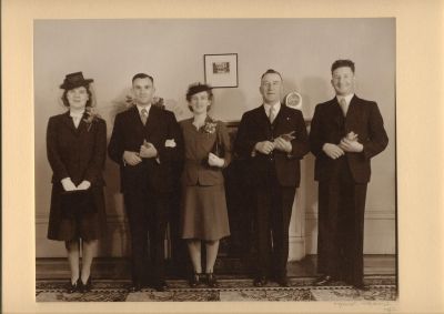 1942 - Mary Dempsey nee Carrucan marries Wal Dempsey
Mary Cecilia CARRUCAN (1917-) married Walter McInnes DEMPSEY (1910-) at Kew in Melbourne in 1942.
Photo shows Eileen O'Sullivan nee Carrucan (bridesmaid), Wal Dempsey, Mary Dempsey nee carrucan), John Carrucan (Mary's father) and John Kelly
