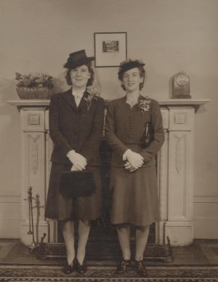 1942 Sept 19 - Mary Carrucan (left) marriage to Wal Dempsey - with her sister Eileen
Mary Cecilia CARRUCAN (1917-) married Walter McInnes DEMPSEY (1910-2010) in 1942.
Also shown is Mary's sister Eileen Carrucan (1919-2000) who married John O'Sullivan in 1953.
Mary and Eileen were great grand children of Patrick Carrucan and Mary O'Brien.
