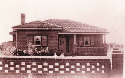 1950s - Kelly house built by Toppy's husband Frank Mulvogue
Mary Jane (Girlie) Carrucan (1889-1961), a grand daughter of Patrick Carrucan, married Michael Joseph (Mick) Ganly (1881-1955) in 1911 and they had eight children: John (Jack), Ellen (Toppy), Mary F. (Molly), Kathleen, Margaret (Peg), Michael (Mick), Malachi and Alicia.
Molly (1916-1992) married Bernard Thomas Kelly (1916-1980) in 1941.
This photo shows the two bedroom home at their market garden at 109 Kingston Road, Heatherton, which was built by their brother in law Frank Mulvogue, the husband of Toppy. All their seven children were born while they lived there.
