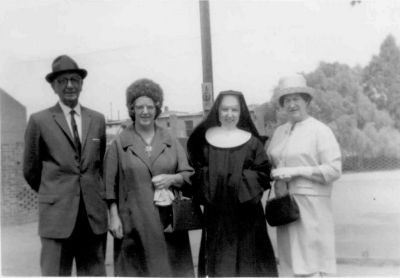 1963 Norm Keele Molly Kelly Maureen Kelly Nell Keele
Maureen Kelly is one of 7 children of Molly (1916-1992) and Bernie Kelly (1916-1980) and is a great great grand daughter of Patrick Carrucan. This photo shows Maureen with her mother and with Norm and Kelly (nee arrucan) Keel on the occasion of her profession as a Brigidine nun in 1963.
