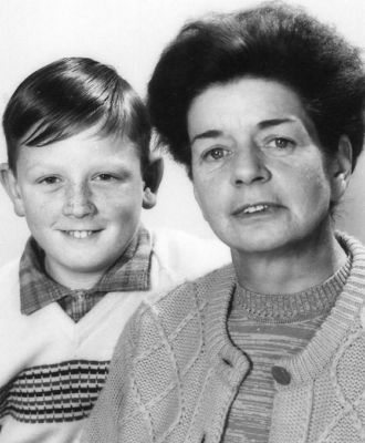 1969 - Kathleen Loretto O'Halloran (nee Calnin) and her son James Matthew O'Halloran
Kathleen Calnin (1919-1969), the youngest daughter of Annie (Babe) Carrucan and James Calnin, was a grand daughter of Patrick and Mary Carrucan. In 1953 she married Matthew O'Halloran and they subsequently had their own family with children Anne (b 1954) and James (b 1956).
This photo, taken in 1969, shows her with her son James.
Kathleen died later that same year in Melbourne from natural causes.
