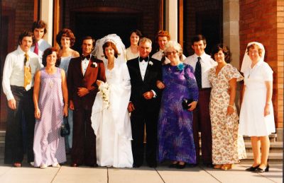 1976 - marriage of Vin Ventura and Theresa Kelly
Mary Frances (Molly) Ganly married Bernard Thomas Kelly at St Patrick's Mentone on 9th August 1941. They had 7 children as follows:
Bernie (1942), Maureen (1944), Tony (1945), Peter (1947), Mick (1948), Theresa (1951) and Christopher (1953).

This photo shows Molly and Bernie at the wedding of their daughter Theresa to Vincent Ventura in 1976 with nearly all of their extended family.

L. Back: Peter with his wife Maree, Mick with his wife Margaret, Bernie
L. Front: Tony with his wife Kitty, the newly weds Vin and Theresa Ventura, Bernie and Molly, Pauline (Bernie's wife) & Maureen.

Only Chris is missing.
