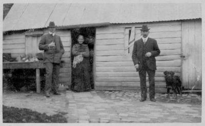 1910 approx - Dalton St Farm: Michael O'Heare, Michael Carrucan, Mary Carrucan (nee O'Brien)
This shows the back of the old Dalton St farm circa 1910. On the left is Michael O'Heare, a well known local solicitor who was one of the groomsmen at Michael Carrucan's wedding (1910). Michael Carrucan is shown on the right and Michael Carrucan's mother Mary (nee O'Brien) who was born in 1838 in Ireland is in the middle. She would have been around 72 at this time. She eventually died in 1927 aged 89.
This photo was no doubt taken by Joseph Rance Douie, a friend of Michael O'Heare. 
