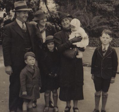 1935 - Leo Mary Mona Carrucan and Mona's children
Monica (Mona) Carrucan, the fourth child of Margaret and Michael Carrucan of Kew, was born in 1896 in Kew. In 1925, she married Joseph Hogan and they had 4 children, Margaret, Bernard, Gregory and Frank. This photo, taken around 1935 shows her with her 4 young children. Also shown in the photo are her younger brother Leo with his wife Mary. The photo is dated around 1925. Mona died in March 1976. She was a granddaughter of Peter and Hannah Carrucan.
