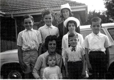 1967 Circa - Family portrait of all the children of Gavin Carrucan and Gwen Lodge with their mother Gwen
Family portrait of all the children of Gavin Carrucan and Gwen Lodge with their mother Gwen. The children are Christine (born 1953), David (born 1955), Louise (born 1957), Michael (born 1958), Andrew (born 1959), Anthony (born 1962) and Suzanne (born 1964). Photo sourced from Gavin's and Gwen's son Michael and passed on by his nephew Kieran Magee, who is a great great grandson of Peter and Hannah.
