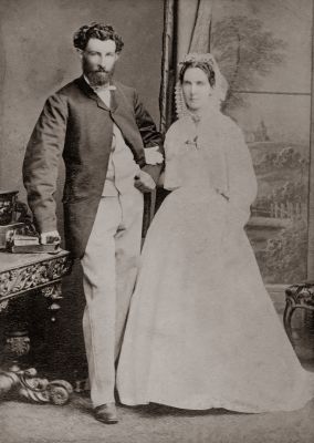 1868-11-10 John Francis Sweeney and Ellen Mary Kenney marriage at St John's Church in Heidelberg
This historic photo captures the wedding of John Francis Sweeney and Ellen Mary Kenney on the 10th of November 1868 at St John’s Church in Heidelberg. Investigation of the original photo showed writing under a glued over backing sheet. Some of the text is indecipherable but it does include ‘To Dear Nellie with fondest love from E..DE..NE   Culla Hill Eltham Victoria.’

The original is in the collection of the Eltham Historical Society and a copy has been purchased for our Sweeney archive.
