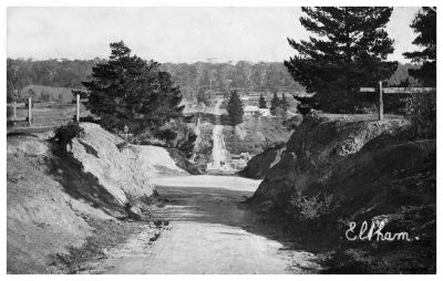 1909-06-16 Nellie Bourke postcard to Frank Ryan - Bridge St and Bourke Residence  - Ryan Collection - writing on back
 Tim Keary, brother of Eliza Bourke married Kate Sweeney. The Bourke residence was named "Woodville" after the town in Galway where the Keary family lived. Tim wrote letters home to the family in Galway from 'Little Eltham' and two of them are in the Sweeney Family book. Nellie has headed this postcard "Woodville" and written "Bourke's Road" at the bottom of the postcard. She writes about last going up to Culla Hill the day John Sweeney was buried in 1909. It is dated 16th of June 1909.

