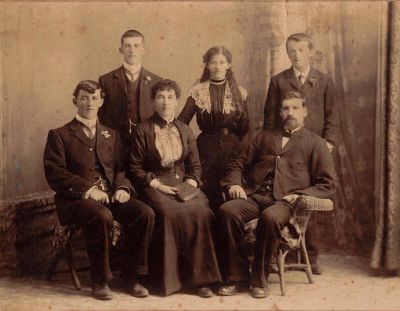 1902 - John Francis Ryan and Ellen Elizabeth Sweeney with children Thomas John Margaret and Francis (Frank)
Ellen Elizabeth Sweeney (1845-1932), one of the daughters of Thomas Sweeney, married John Francis Ryan in 1880 in Cormandel, NZ. They are shown here with their 4 children Thomas Joseph "Tom" (born 1882), Margaret Katherine "Tissa" (born 1883), John Desmond "Des" (born 1885) and Francis Michael "Frank" born 1887. They were living in Waihu, NZ, at the time.
