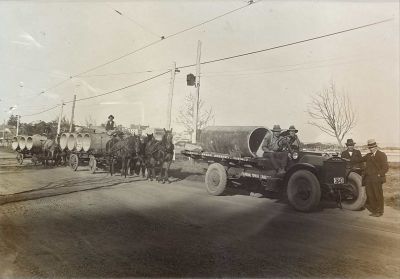 1924 - Frank Sweeney, Perth
Frank Sweeney, who was born 26 May 1882 and who died 18 August 1952, was a grandson of Thomas Sweeney. He relocated from Eltham to Perth somewhere around 1904. In the 1906 Electoral Roll, he is a driver living in Park St, Subiaco. He and his wife Ellen (Sullivan) had 7 children, born between 1912 and 1925.

Thanks to Frank Sweeney for this photo shows him at work in his carrier business. The tray is painted "CARRIER FRANK SWEENEY SUBIACO".
