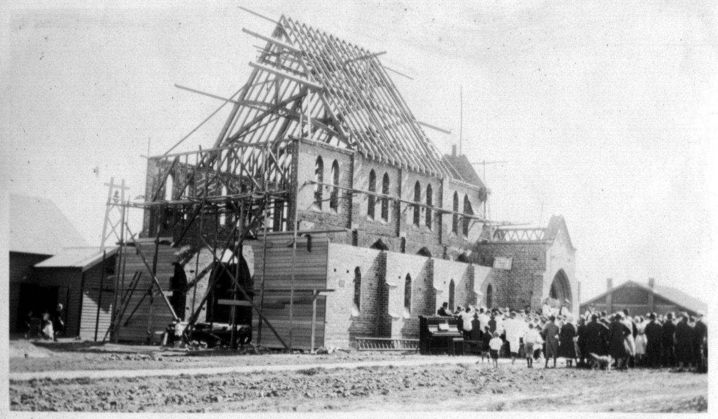 1932-02-20 - Laying of Foundation Stone
In January 1932, when the church was under construction, Archbishop Head came for the placing of the memorial stone at the North East corner of the church porch (in Delta Avenue) on Saturday 20 February at 3 PM.  The inscription reads:
"To the greater glory of God.  This stone was laid on 20th February Anno Domii 1932 by the Most Rev. Frederick Waldergrave Head, D.D.' Archbishop of Melbourne.  Rev. W. Clarke Hudson, M.A.,  Vicar. C.R. Heath A.R.A.I.A., architect". 
The mayor (Cr J J Anderson), and other councillors were present, along with a large group of clergy. 
