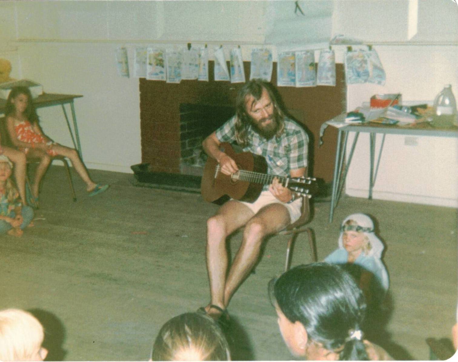 1984 Rev. Allan Cadwallader on the guitar
Rev. Allan Cadwallader was the vicar of St Linus Merlynston from 1983 to 1988. Here Allan provides the music at St Linus Kindergarten Christmas Carols in 1984.
