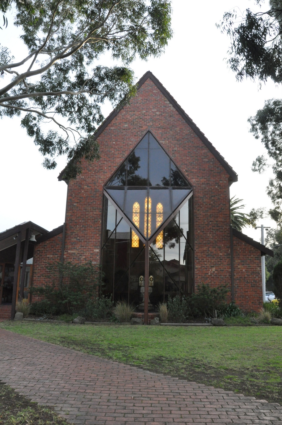 2016 Church Front View
This 2016 photo shows the front window, as viewed from Glyndon Avenue. This window was erected as part of the 1978 refurbishment and replaced what was a temporary wooden wall, erected in 1932 when the church building had to be stopped as available funds were exhausted. It was a temporary wall that lasted 46 years!

