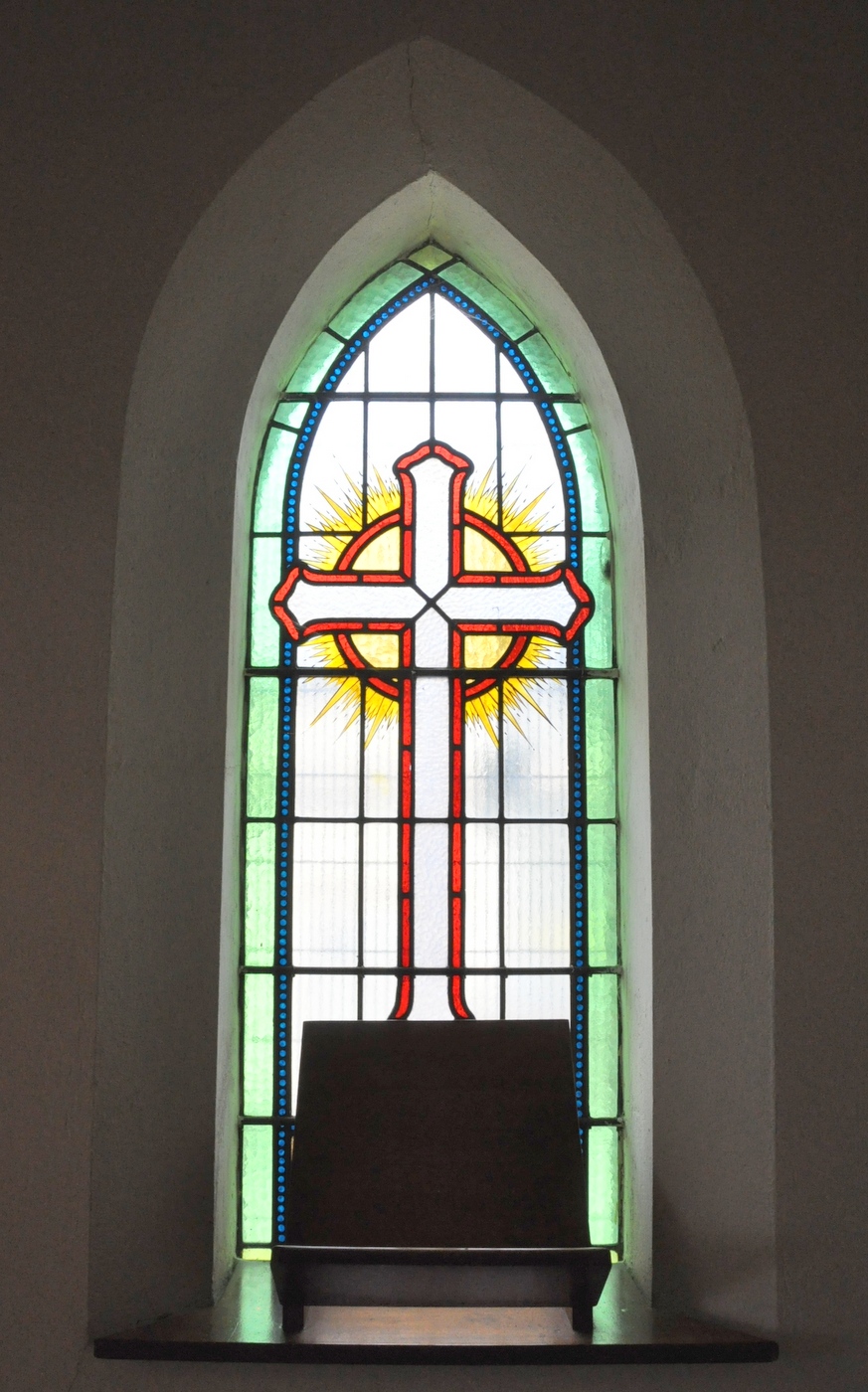Window behind organ
You can easily miss this final stained glass window, given that it is hidden behind the Moyle organ, on the northern side of the church. It has no additional writing to indicate that it has been created in memorial of some significant person. It is simply a stained glass window, if there is such a thing! All stained glass windows tell their own story.
